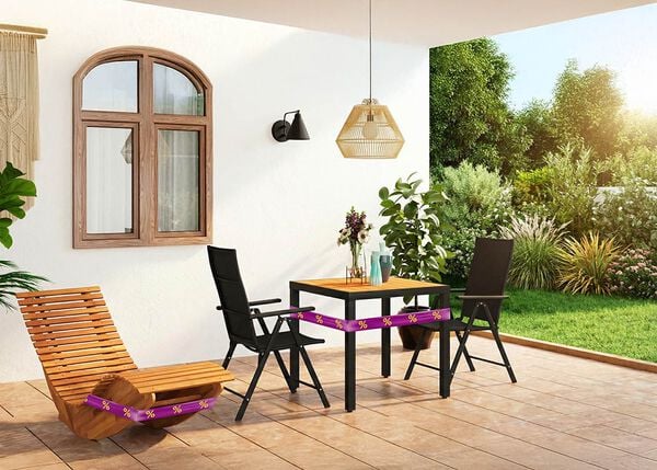 Wooden rocking sun lounger, and a black table with 2 chairs on a terrace, wrapped in purple-yellow discount ribbon.