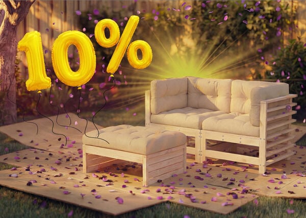Wooden outdoor lounge sofa with beige cushions and matching ottoman in a garden setting, surrounded by pink confetti and golden 10% discount balloons, highlighting a seasonal sale on outdoor seating furniture.