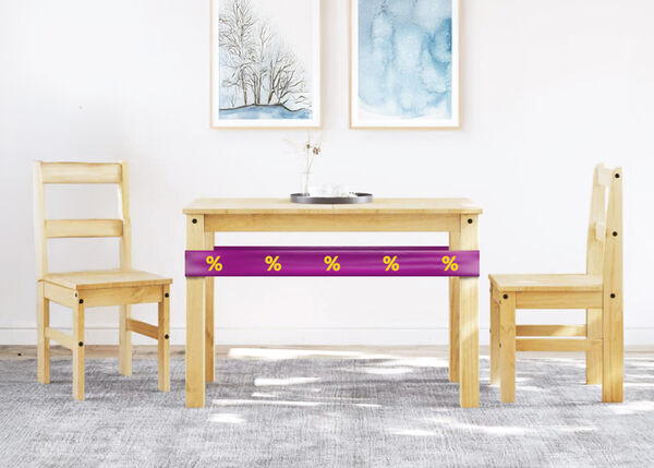 Wooden table and chairs set with purple ribbon showing discount icons, in a styled dining area.