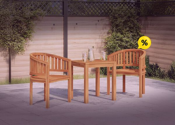 Two wooden chairs and a table on a patio with greenery and yellow discount icons. Click to see the products in the offer.