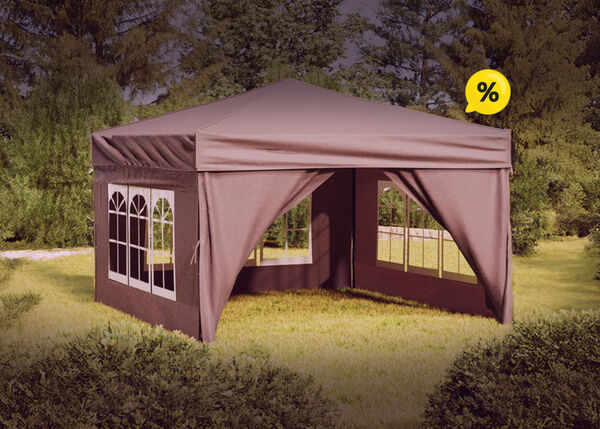 Tent in nature with table and chairs inside, and yellow discount icons. Click to see the products in the offer.