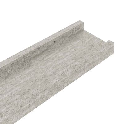 Corner/top view of gray concrete-like shelf with back edge and notch