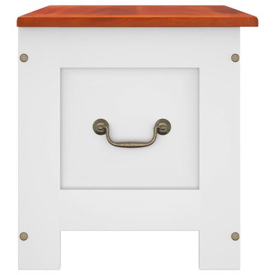 Close-up of white storage bench front with brass drawer pull.
