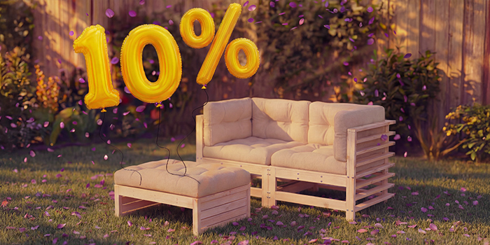 Wooden outdoor lounge sofa with beige cushions and matching ottoman in a garden setting, surrounded by pink confetti and golden 10% discount balloons, highlighting a seasonal sale on outdoor seating furniture.